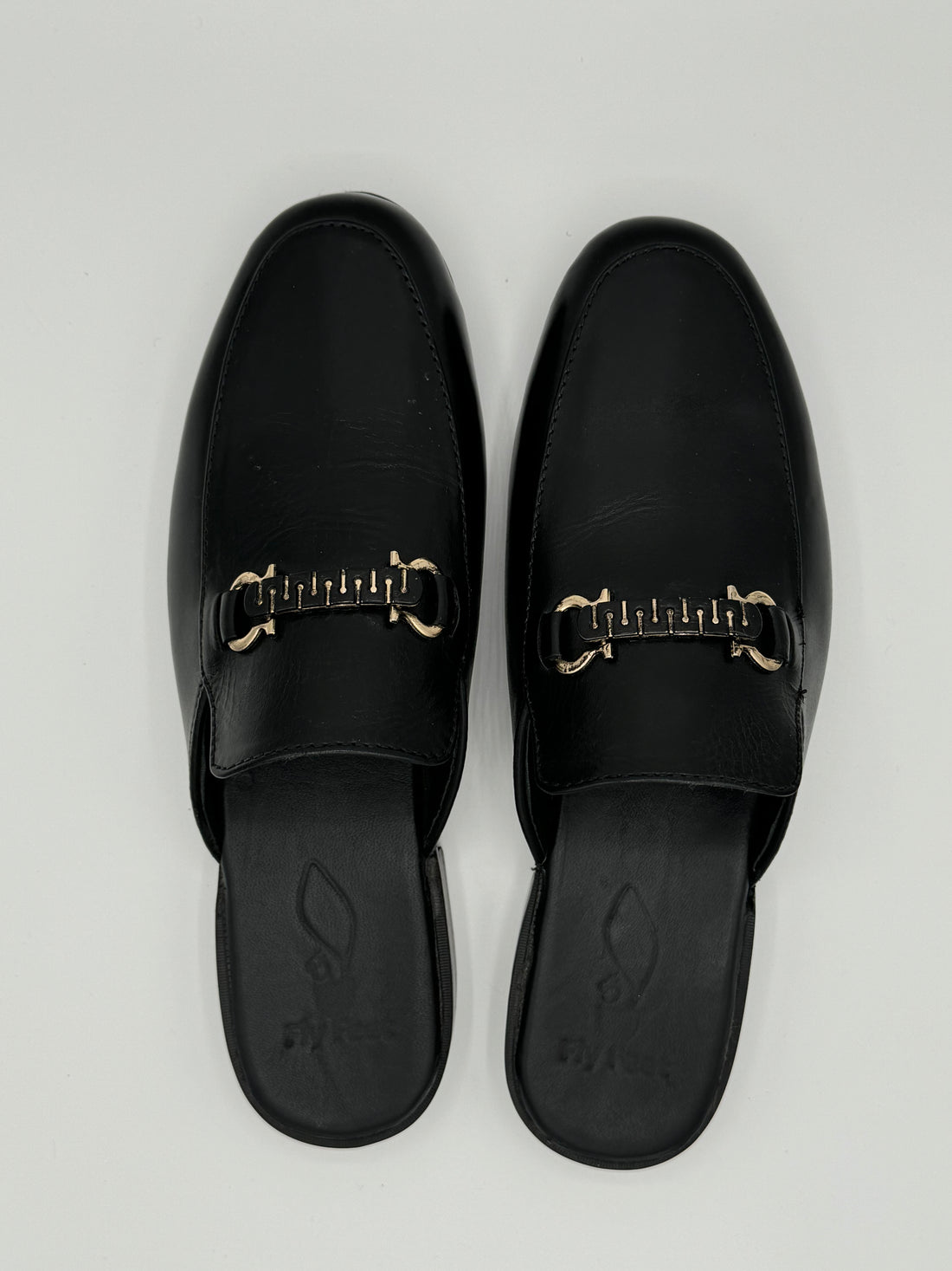 The Black Leather Mules – Timeless Elegance & Comfort